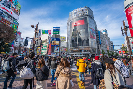 Shibuya, Tokyo, Japan - December 26, 2018: Crowd pedestrians people walking on zebra crosswalk at Shibuya district in Tokyo, Japan in the morning. Famous busiest shopping for tourist and business.のeditorial素材