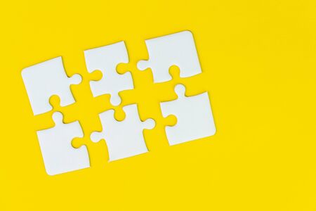 6 jigsaw puzzle on solid yellow background using as six important thing, solutions combine or...