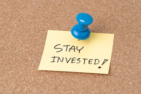 Stay invested, Investment decision idea to stay the course when stock market crisis concept,...