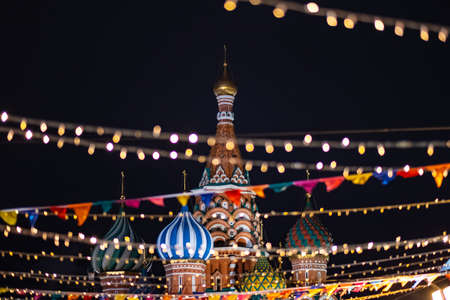 Moscow, Russia. January 01, 2020. View of St. Basil's Cathedral through the garlands of festive New Year's illumination on Red Square in Moscow.のeditorial素材