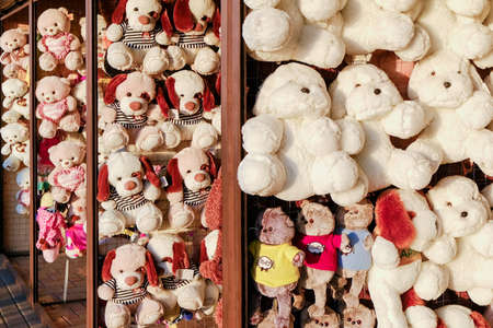 Moscow. Russia. August 17, 2020 Lots of white plush stuffed toys on the shelves. Bears, dogs, cats...