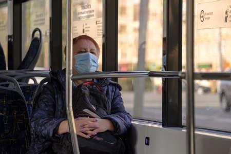 Moscow. Russia. October 4, 2020. A woman in abus with a medical mask on her face. The second wave of...