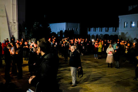 Moscow. Russia. May 11, 2021. Many people with candles in their hands in the street at night. Prayer...