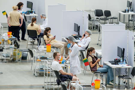 Moscow. Russia. 01 August 2021. A modern coronavirus vaccination center in Moscow. Doctors vaccinate...