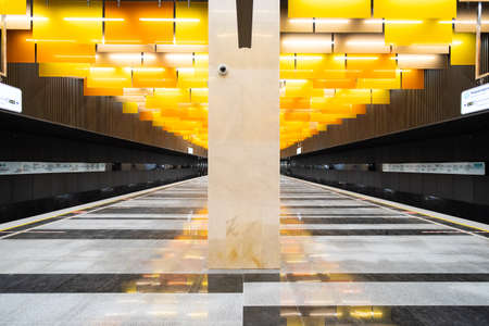 December 8, 2021. Moscow. Russia. A symmetrical view of the interior of the new Novatorskaya subway station on a section of the Moscow metros big circle line.のeditorial素材