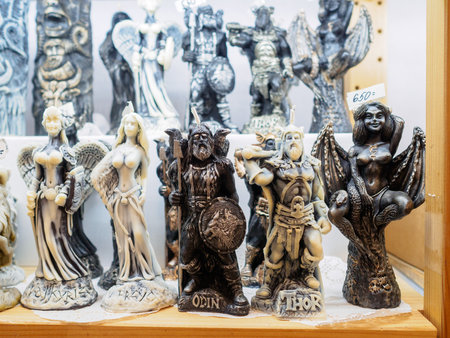 Moscow. Russia. February 14, 2022. Handmade candles in the form of Scandinavian gods on a shelf in a store. Selective focus. High quality photoのeditorial素材