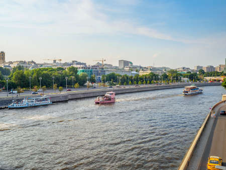 Moscow. Russia. June 26, 2021. A view of the Moscow River from the Patriarchs Bridge in the historic center of Moscow. A flotilla of pleasure ships floats on the water, rolling tourists.のeditorial素材
