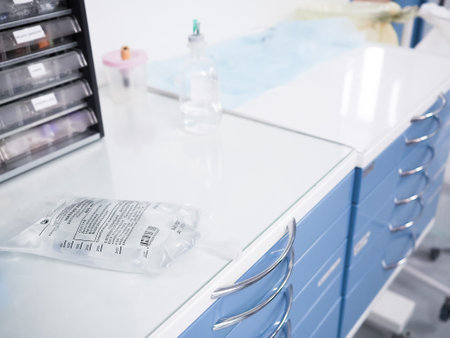 Moscow. Russia. December 24, 2021. A transparent bag of saline for an intravenous drip in the hospital on the table.のeditorial素材