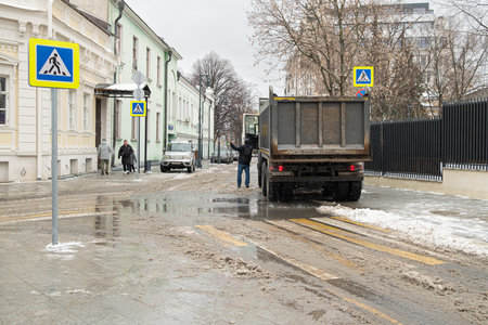 Moscow. Russia. February 25, 2023. Truck in Prechistensky Lane in Moscow on a cloudy winter day.のeditorial素材