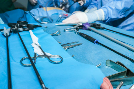 Sterile surgical clamp and other instruments on the table during a surgical operation. Selective focus.の写真素材