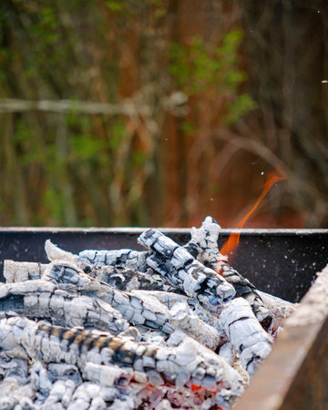 Hot coals and ashes in a brazier. selective focus.の写真素材