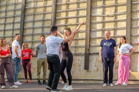 Moscow. Russia. July 1, 2023. Moscow. Russia. July 1, 2023. Beautiful couple dancing bachata outside on a sunny summer day.のeditorial素材