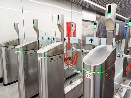 Modern automatic turnstiles made of stainless steel close-up inside a Moscow metro station. Moscow. Russia. February 8, 2024.のeditorial素材