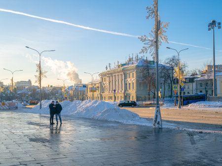 Huge piles of snow on Volkhonka Street in Moscow on a sunny winter day. City street covered with snow after a snowfall. Moscow. Russia. January 19, 2024.のeditorial素材