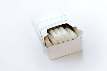 package of cigarettes isolated on white backgroundの写真素材