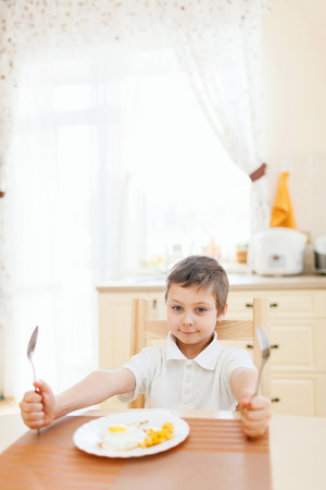 Portrait of little boy in the kitchenの写真素材