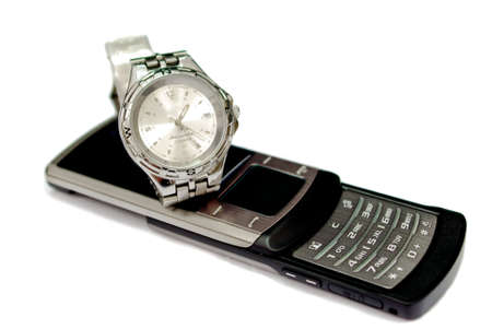 Watch on mobile phone isolated on white