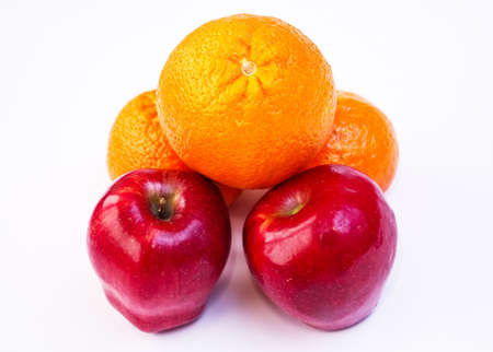 Stack of oranges and appleの写真素材