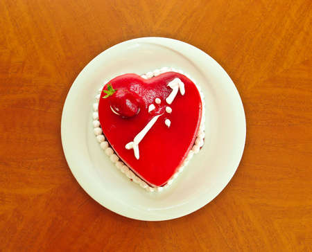 Red cake in shape of heartの写真素材