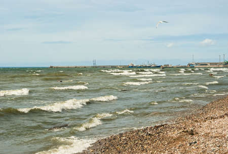 Waves in sea on windy dayの写真素材