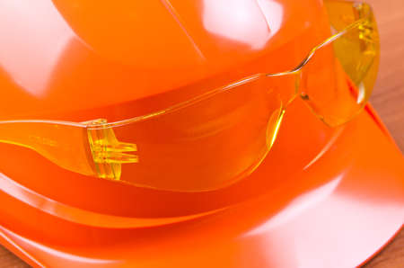 Protective helmet and glasses close up