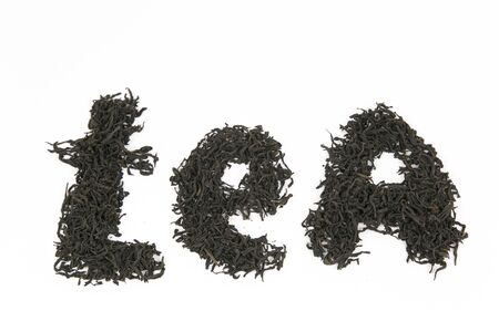 the word tea on white background Letters of black tea on a white backgroundの写真素材