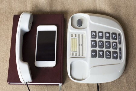 Old telephone and mobile,concepts compare new and old technologies.