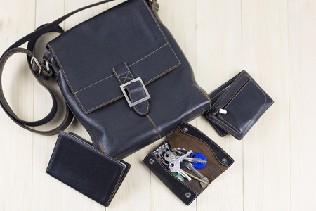Leather goods for men. A set of men's leather accessories, a bag, a passport cover, a wallet, a...