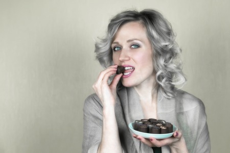 Smile is eating candy. Balsamic hair