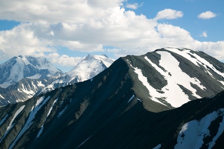 View from the top of the mountain. High mountains landscape, breathtaking beauty of the mountains.の写真素材