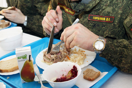Orenburg, Russia, 05/16/2008. Dining room in a military unit. Editorial Dining room in the army, food soldiers. Russian dining room Dinner conscripts and contract soldiers.のeditorial素材