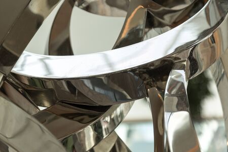 Abstract figures of metal and steel. Steel shiny structures of arbitrary shape reflection, blank for design.の写真素材