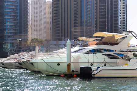Marina for private yachts in the city center Private luxury yachts moored in city marina of an...