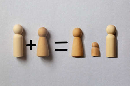 The union of a man and a woman leads to the creation of a family and the birth of children. Concept.