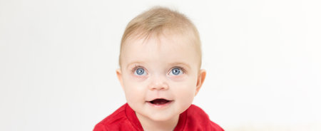 Adorable little girl with huge eyes and long eyelashes on a white background,の写真素材