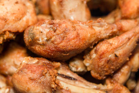 Fried chicken, drumstick and bedo with spices.の写真素材