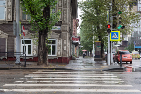 Russia, Irkutsk-July 30, 2021. City street in rainy weather, editorial.のeditorial素材