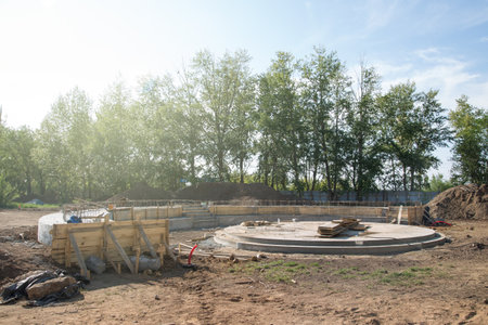 Construction of round stage stage for performances, pouring the foundation with concrete.