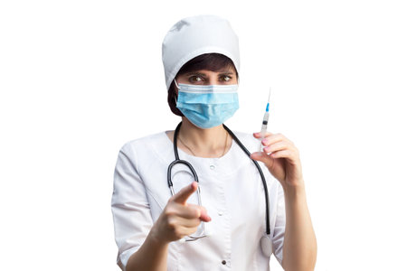 Doctor with a syringe with an injection points his finger camera calling for vaccination.の写真素材