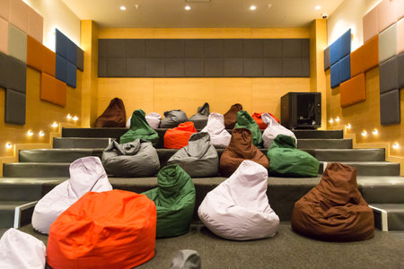 Children's cinema with soft bags, seat cushions and a TV.の写真素材