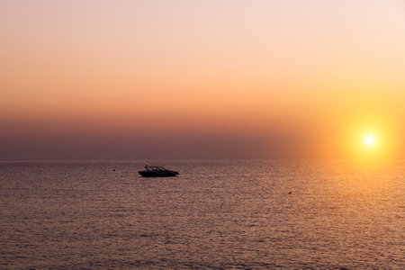 Orange sunrise over the sea, beautiful landscape with ocean.の写真素材