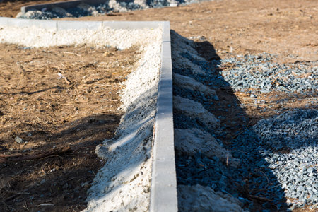 Close up curbstone reinforced with concrete.の写真素材