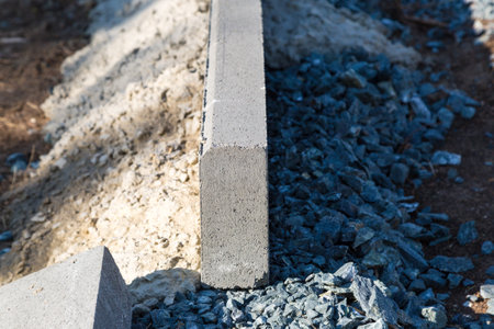 Close-up of curbstone reinforced with concrete.の写真素材