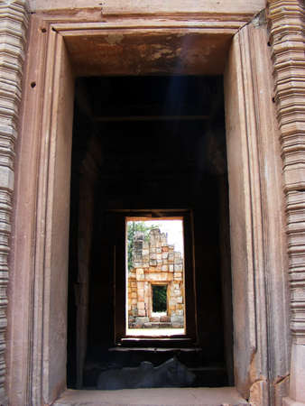 Old temple door a large stone carving in ancient timesの写真素材