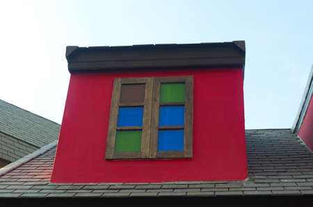 Window and red wallの写真素材