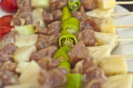 Grilling a steak on the barbecueの写真素材