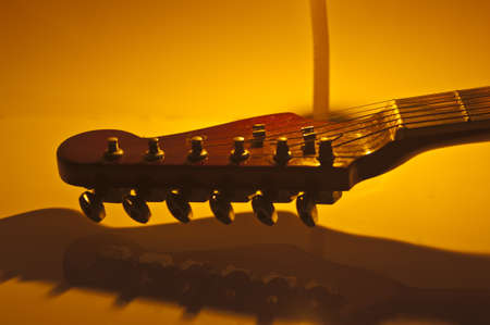 Classical acoustic guitar and candlelightの写真素材