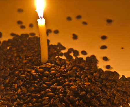 Coffee beans and candlelightの写真素材
