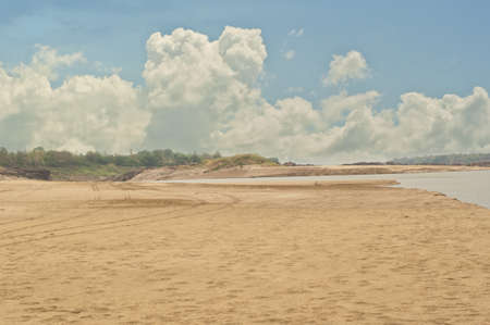 The long sandy beach and beautiful skyの写真素材