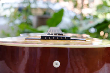 acoustic guitar with shallow depth of field